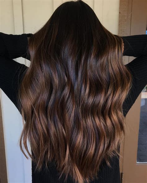 dark brown hair with light brown highlights